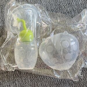 haakaa manual pump with stopper and haakaa ladybug milk catcher set